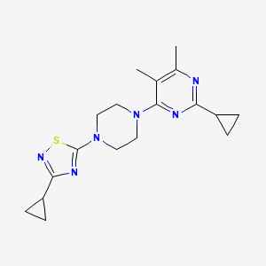 molecular formula C18H24N6S B6457291 2-cyclopropyl-4-[4-(3-cyclopropyl-1,2,4-thiadiazol-5-yl)piperazin-1-yl]-5,6-dimethylpyrimidine CAS No. 2549007-01-2