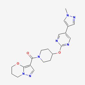 molecular formula C20H23N7O3 B6462905 5-(1-methyl-1H-pyrazol-4-yl)-2-[(1-{5H,6H,7H-pyrazolo[3,2-b][1,3]oxazine-3-carbonyl}piperidin-4-yl)oxy]pyrimidine CAS No. 2549054-17-1