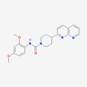 N-(2,4-dimethoxyphenyl)-4-(1,8-naphthyridin-2-yl)piperidine-1-carboxamide