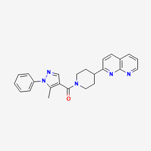 2-[1-(5-methyl-1-phenyl-1H-pyrazole-4-carbonyl)piperidin-4-yl]-1,8-naphthyridine