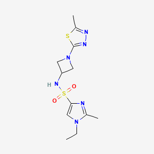 molecular formula C12H18N6O2S2 B6473660 1-ethyl-2-methyl-N-[1-(5-methyl-1,3,4-thiadiazol-2-yl)azetidin-3-yl]-1H-imidazole-4-sulfonamide CAS No. 2640958-20-7