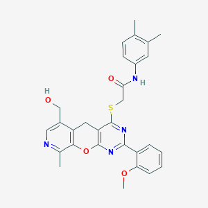 N-(3,4-dimethylphenyl)-2-{[11-(hydroxymethyl)-5-(2-methoxyphenyl)-14-methyl-2-oxa-4,6,13-triazatricyclo[8.4.0.0^{3,8}]tetradeca-1(10),3(8),4,6,11,13-hexaen-7-yl]sulfanyl}acetamide