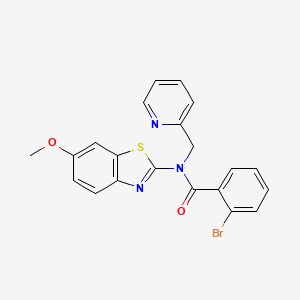 2-bromo-N-(6-methoxy-1,3-benzothiazol-2-yl)-N-[(pyridin-2-yl)methyl]benzamide