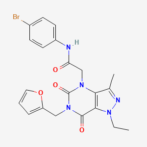 N-(4-bromophenyl)-2-{1-ethyl-6-[(furan-2-yl)methyl]-3-methyl-5,7-dioxo-1H,4H,5H,6H,7H-pyrazolo[4,3-d]pyrimidin-4-yl}acetamide