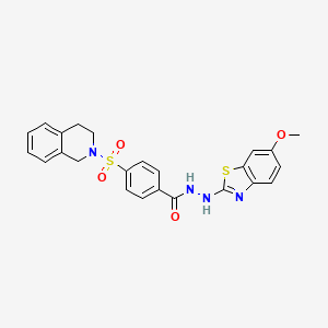 B6489677 N'-(6-methoxy-1,3-benzothiazol-2-yl)-4-(1,2,3,4-tetrahydroisoquinoline-2-sulfonyl)benzohydrazide CAS No. 851979-84-5