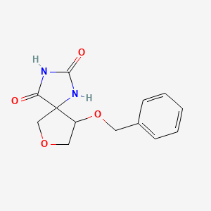 molecular formula C13H14N2O4 B6500010 9-(benzyloxy)-7-oxa-1,3-diazaspiro[4.4]nonane-2,4-dione CAS No. 2549021-52-3