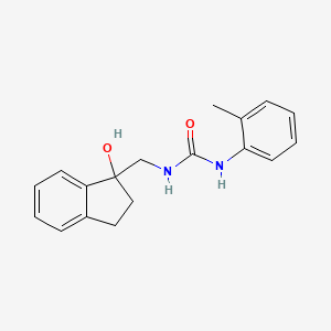 molecular formula C18H20N2O2 B6501865 3-[(1-hydroxy-2,3-dihydro-1H-inden-1-yl)methyl]-1-(2-methylphenyl)urea CAS No. 1351617-40-7