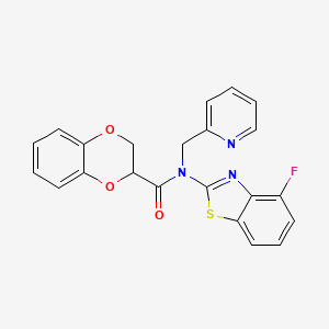 N-(4-fluoro-1,3-benzothiazol-2-yl)-N-[(pyridin-2-yl)methyl]-2,3-dihydro-1,4-benzodioxine-2-carboxamide