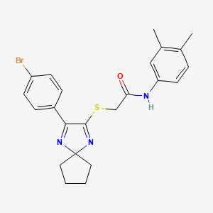 2-{[3-(4-bromophenyl)-1,4-diazaspiro[4.4]nona-1,3-dien-2-yl]sulfanyl}-N-(3,4-dimethylphenyl)acetamide