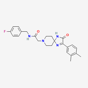 2-[2-(3,4-dimethylphenyl)-3-oxo-1,4,8-triazaspiro[4.5]dec-1-en-8-yl]-N-[(4-fluorophenyl)methyl]acetamide