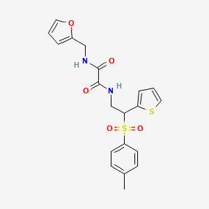 molecular formula C20H20N2O5S2 B6520549 N-[(furan-2-yl)methyl]-N'-[2-(4-methylbenzenesulfonyl)-2-(thiophen-2-yl)ethyl]ethanediamide CAS No. 896344-41-5