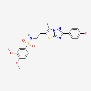 N-{2-[2-(4-fluorophenyl)-6-methyl-[1,2,4]triazolo[3,2-b][1,3]thiazol-5-yl]ethyl}-3,4-dimethoxybenzene-1-sulfonamide