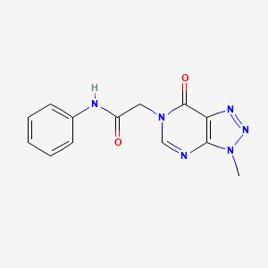 molecular formula C13H12N6O2 B6529428 2-{3-methyl-7-oxo-3H,6H,7H-[1,2,3]triazolo[4,5-d]pyrimidin-6-yl}-N-phenylacetamide CAS No. 946306-52-1