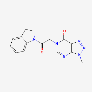 molecular formula C15H14N6O2 B6529434 6-[2-(2,3-dihydro-1H-indol-1-yl)-2-oxoethyl]-3-methyl-3H,6H,7H-[1,2,3]triazolo[4,5-d]pyrimidin-7-one CAS No. 946240-02-4