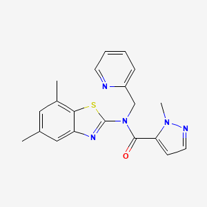 N-(5,7-dimethyl-1,3-benzothiazol-2-yl)-1-methyl-N-[(pyridin-2-yl)methyl]-1H-pyrazole-5-carboxamide
