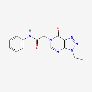 molecular formula C14H14N6O2 B6533183 2-{3-ethyl-7-oxo-3H,6H,7H-[1,2,3]triazolo[4,5-d]pyrimidin-6-yl}-N-phenylacetamide CAS No. 1070807-05-4