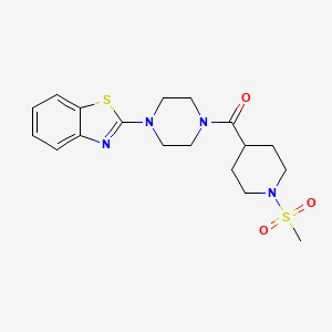 molecular formula C18H24N4O3S2 B6538340 2-[4-(1-methanesulfonylpiperidine-4-carbonyl)piperazin-1-yl]-1,3-benzothiazole CAS No. 1021215-07-5
