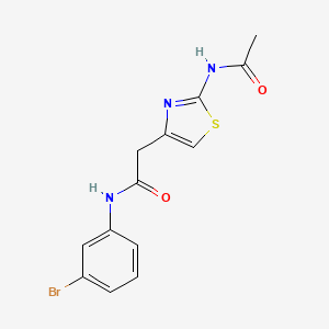 N-(3-bromophenyl)-2-(2-acetamido-1,3-thiazol-4-yl)acetamide