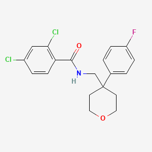 2,4-dichloro-N-{[4-(4-fluorophenyl)oxan-4-yl]methyl}benzamide