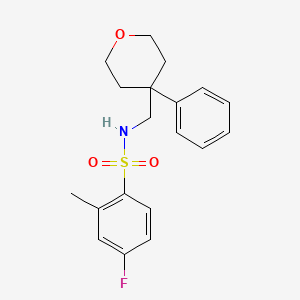 4-fluoro-2-methyl-N-[(4-phenyloxan-4-yl)methyl]benzene-1-sulfonamide