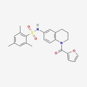 molecular formula C23H24N2O4S B6563214 N-[1-(furan-2-carbonyl)-1,2,3,4-tetrahydroquinolin-6-yl]-2,4,6-trimethylbenzene-1-sulfonamide CAS No. 946380-15-0