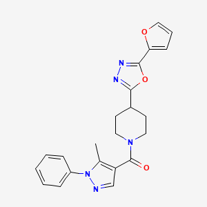 molecular formula C22H21N5O3 B6581908 4-[5-(furan-2-yl)-1,3,4-oxadiazol-2-yl]-1-(5-methyl-1-phenyl-1H-pyrazole-4-carbonyl)piperidine CAS No. 1210510-93-2