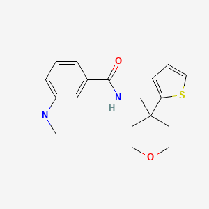 3-(dimethylamino)-N-{[4-(thiophen-2-yl)oxan-4-yl]methyl}benzamide