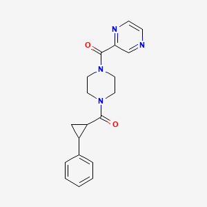 molecular formula C19H20N4O2 B6582330 2-[4-(2-phenylcyclopropanecarbonyl)piperazine-1-carbonyl]pyrazine CAS No. 1210515-38-0