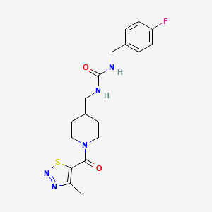 molecular formula C18H22FN5O2S B6587954 1-[(4-fluorophenyl)methyl]-3-{[1-(4-methyl-1,2,3-thiadiazole-5-carbonyl)piperidin-4-yl]methyl}urea CAS No. 1235058-50-0
