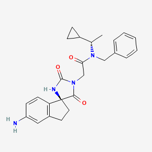 molecular formula C25H28N4O3 B6600000 2-[(4S)-5'-amino-2,5-dioxo-2',3'-dihydrospiro[imidazolidine-4,1'-inden]-1-yl]-N-benzyl-N-[(1S)-1-cyclopropylethyl]acetamide CAS No. 1889287-55-1