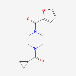 molecular formula C13H16N2O3 B6600216 [4-(Cyclopropanecarbonyl)piperazin-1-yl](furan-2-yl)methanone CAS No. 6391-74-8