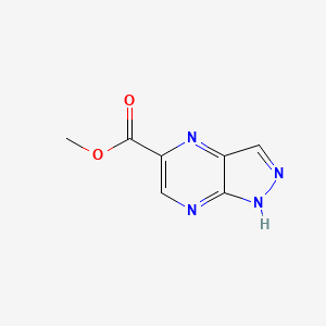 molecular formula C7H6N4O2 B6601565 methyl 1H-pyrazolo[3,4-b]pyrazine-5-carboxylate CAS No. 1822669-63-5