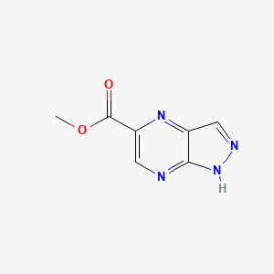 molecular formula C7H6N4O2 B6601565 1H-吡唑并[3,4-b]吡嗪-5-甲酸甲酯 CAS No. 1822669-63-5