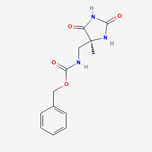 molecular formula C13H15N3O4 B6605694 rel-benzyl N-{[(4R)-4-methyl-2,5-dioxoimidazolidin-4-yl]methyl}carbamate CAS No. 2260931-00-6