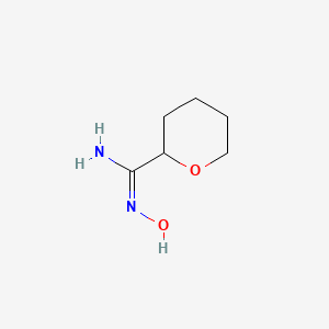 molecular formula C6H12N2O2 B6605849 (E)-N'-hydroxyoxane-2-carboximidamide CAS No. 2102864-07-1