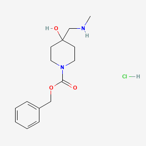 benzyl 4-hydroxy-4-[(methylamino)methyl]piperidine-1-carboxylate hydrochloride