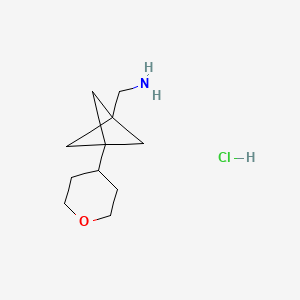 1-[3-(oxan-4-yl)bicyclo[1.1.1]pentan-1-yl]methanamine hydrochloride