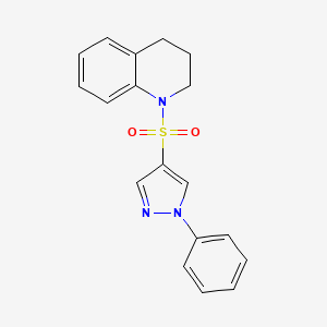 molecular formula C18H17N3O2S B6619872 1-(1-phenylpyrazol-4-yl)sulfonyl-3,4-dihydro-2H-quinoline 