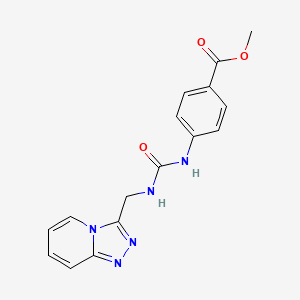 molecular formula C16H15N5O3 B6622213 Methyl 4-{[([1,2,4]triazolo[4,3-a]pyridin-3-ylmethyl)carbamoyl]amino}benzoate 