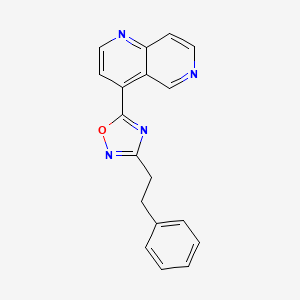molecular formula C18H14N4O B6622882 5-(1,6-Naphthyridin-4-yl)-3-(2-phenylethyl)-1,2,4-oxadiazole 