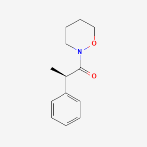 molecular formula C13H17NO2 B6624001 (2R)-1-(oxazinan-2-yl)-2-phenylpropan-1-one 