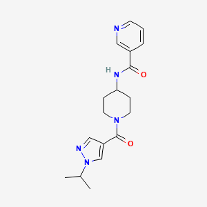 molecular formula C18H23N5O2 B6624590 N-[1-(1-propan-2-ylpyrazole-4-carbonyl)piperidin-4-yl]pyridine-3-carboxamide 