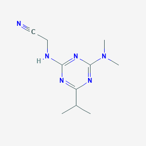 molecular formula C10H16N6 B6625768 2-[[4-(Dimethylamino)-6-propan-2-yl-1,3,5-triazin-2-yl]amino]acetonitrile 