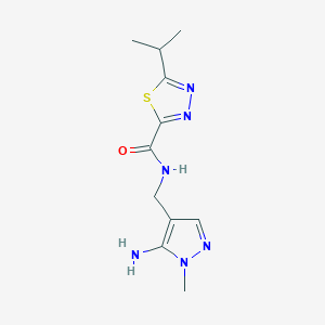 molecular formula C11H16N6OS B6626164 N-[(5-amino-1-methylpyrazol-4-yl)methyl]-5-propan-2-yl-1,3,4-thiadiazole-2-carboxamide 