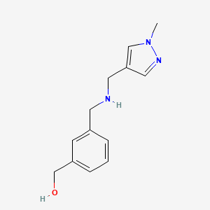 molecular formula C13H17N3O B6628913 [3-[[(1-Methylpyrazol-4-yl)methylamino]methyl]phenyl]methanol 