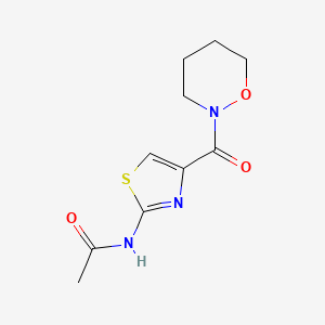 molecular formula C10H13N3O3S B6630975 N-[4-(oxazinane-2-carbonyl)-1,3-thiazol-2-yl]acetamide 