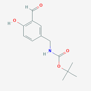 molecular formula C13H17NO4 B6632981 tert-butyl N-[(3-formyl-4-hydroxyphenyl)methyl]carbamate 