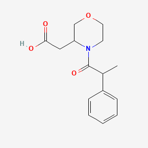 molecular formula C15H19NO4 B6635639 2-[4-(2-Phenylpropanoyl)morpholin-3-yl]acetic acid 