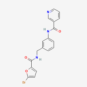 molecular formula C18H14BrN3O3 B6636423 N-[3-[[(5-bromofuran-2-carbonyl)amino]methyl]phenyl]pyridine-3-carboxamide 