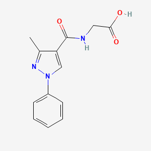 molecular formula C13H13N3O3 B6636903 2-[(3-Methyl-1-phenylpyrazole-4-carbonyl)amino]acetic acid 